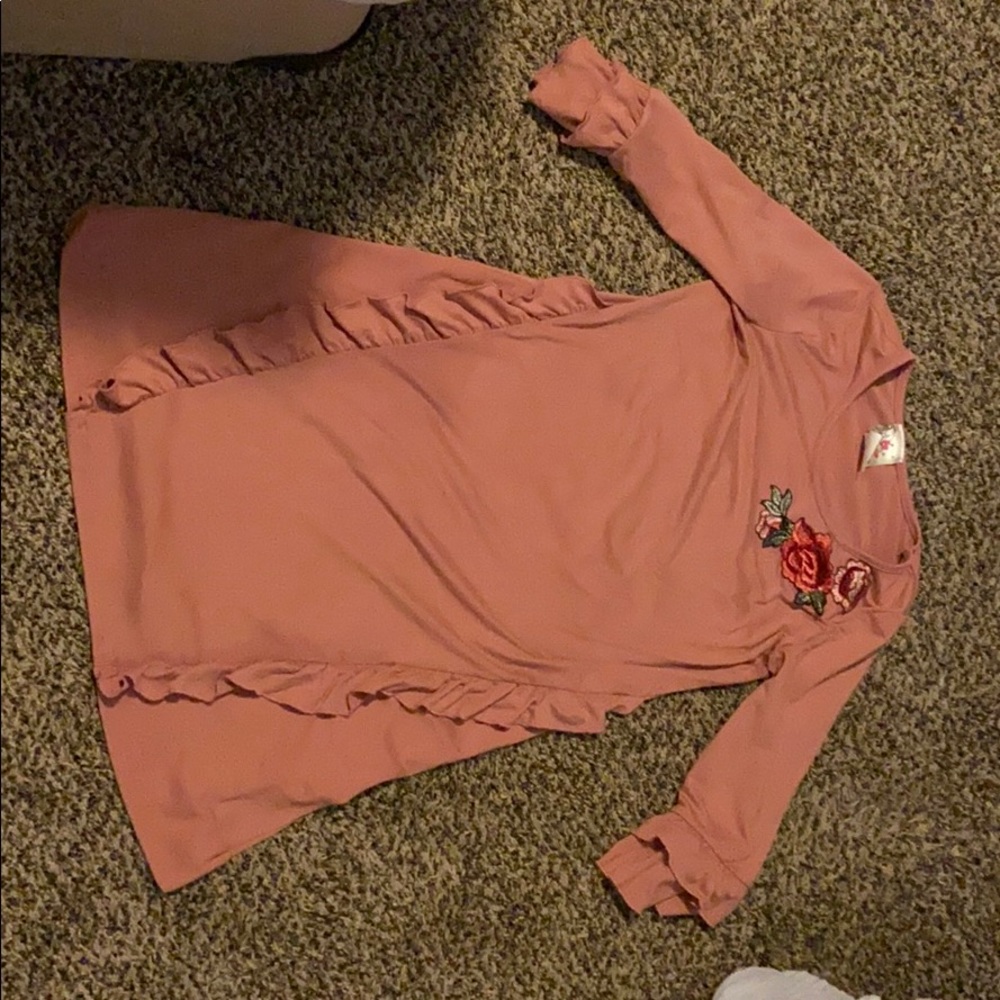 Dark pink dress with ruffles and a rose